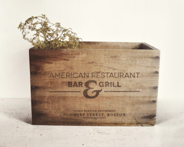 Wooden box with American Restaurant logo.