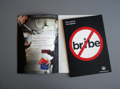 Anti-bribery campaign materials with no-bribe symbol.